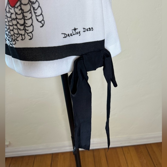 Vintage tunic from the 1960s/70s w/adorable girl applying mascara. Darling Debs - Picture 4 of 5